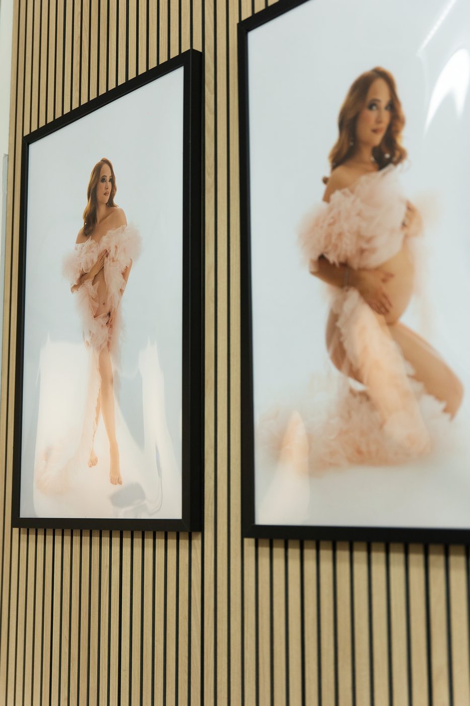 Maternity portraits on the studio wall
